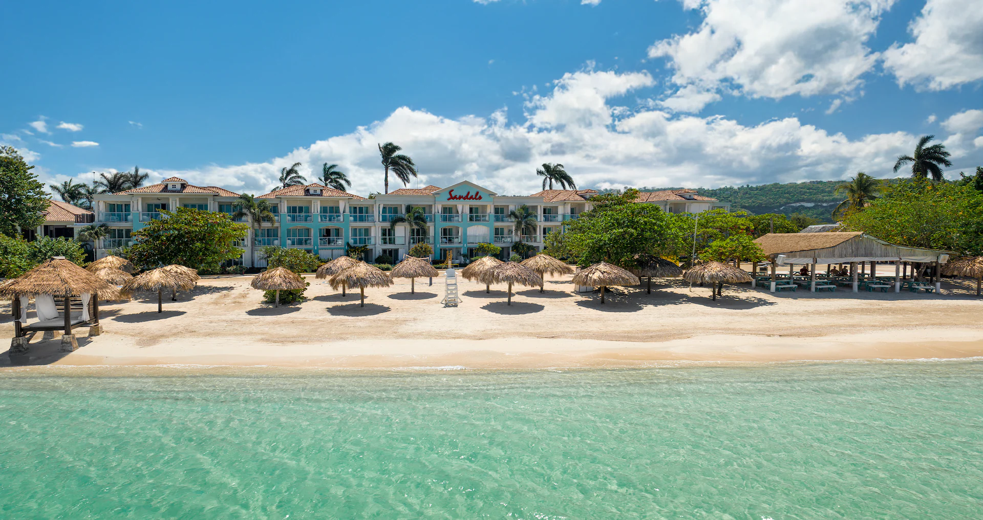 Sandals Montego Bay beachfront at sunset