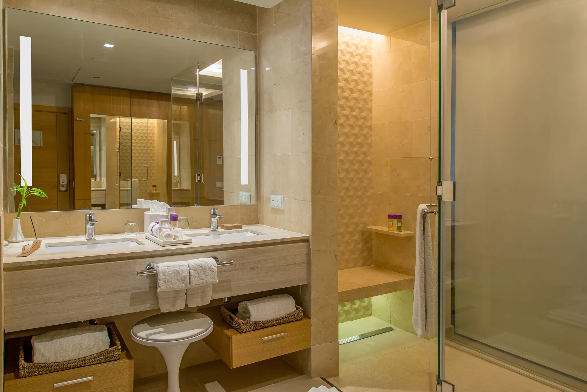 Allure Junior Suite Ocean View king bedroom at Breathless Montego Bay featuring modern décor and balcony views.